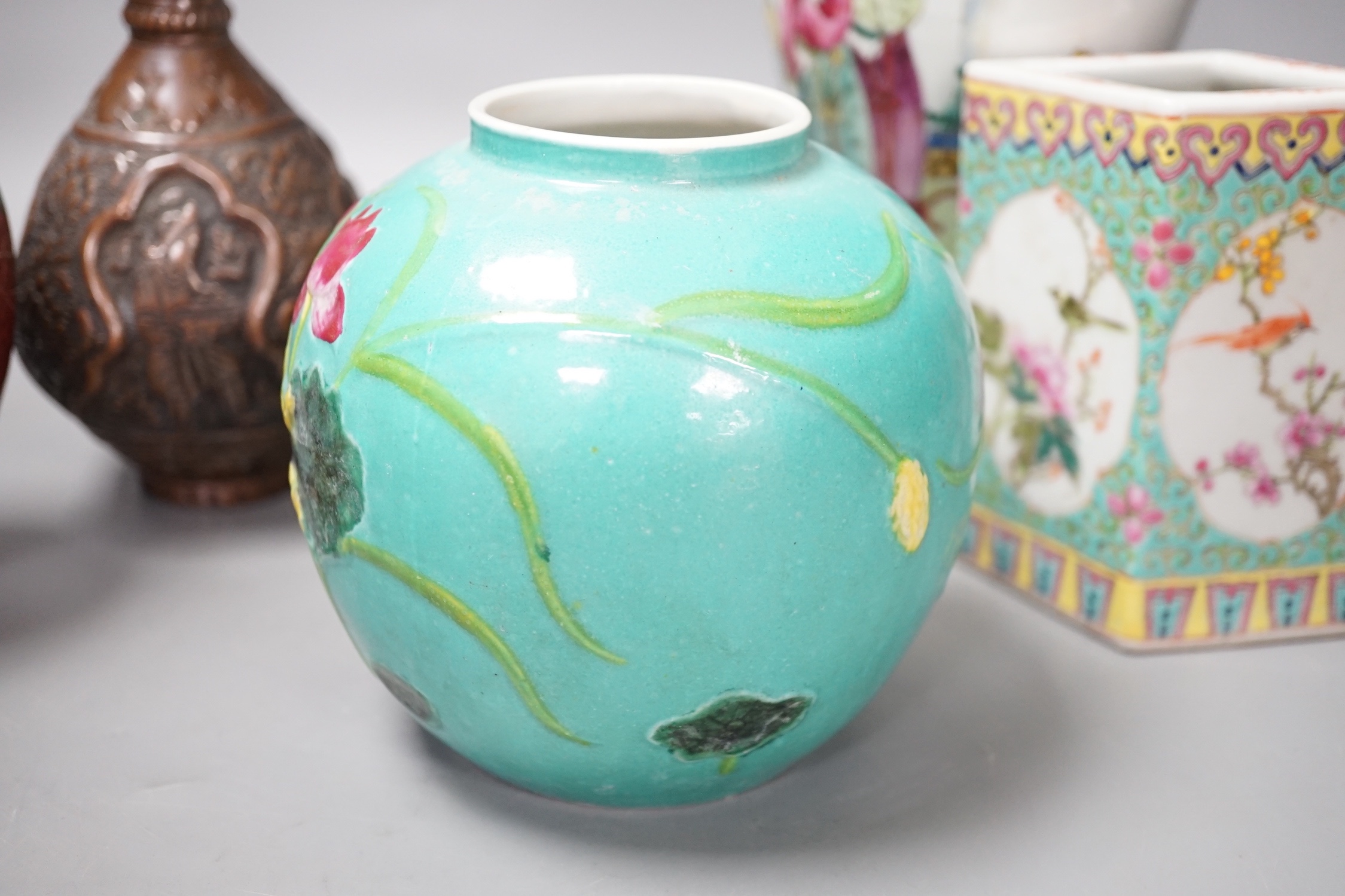 A group of Chinese porcelain vases, a cloisonné enamel vase and pot and a Middle Eastern metal vase, tallest 23 cm